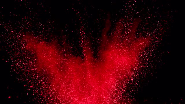 red powder exploding on black background in super slow motion sho stock footage nimia com nimia com